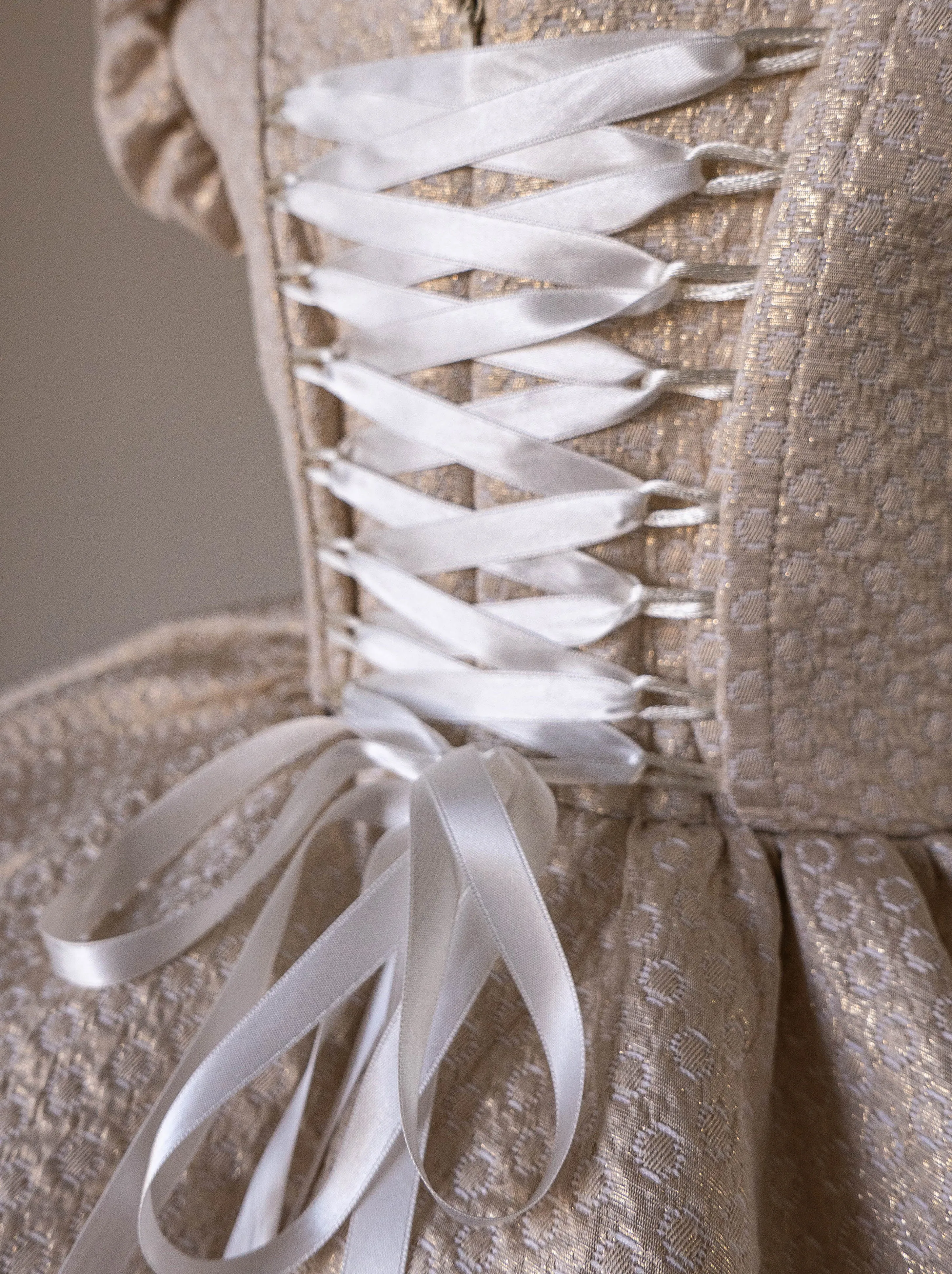Doll dress in gold