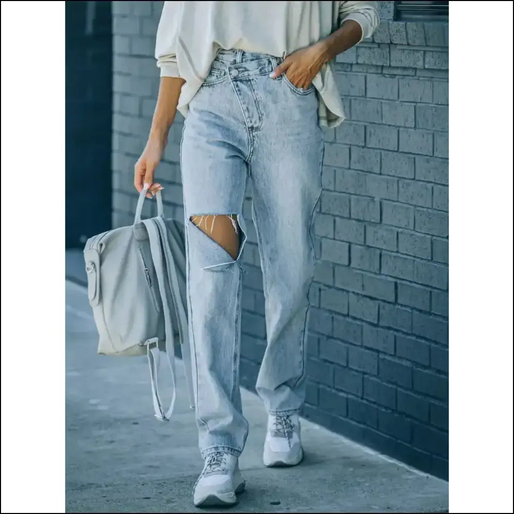 Rock your Freedom with Chic Distressed Asymmetric Waist Jeans😂✨